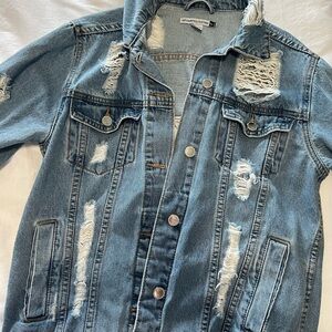 Women’s ripped denim jacket